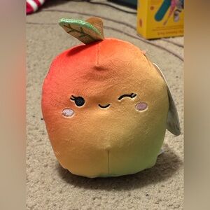 NWT Squishmallows fruit character whose name is Ximena